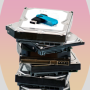 usb flash drive liying on top of the hard drive