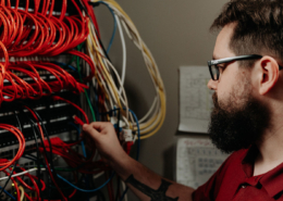 Sovran employee adjusting cables
