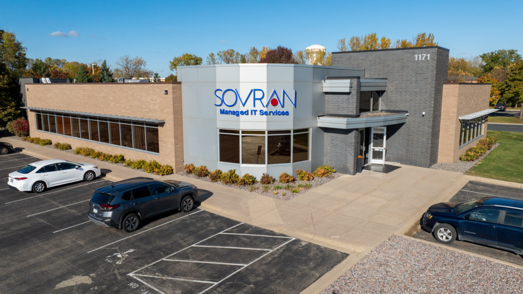 Drone picture of exterior of Sovran building front, brick and metal exterior.