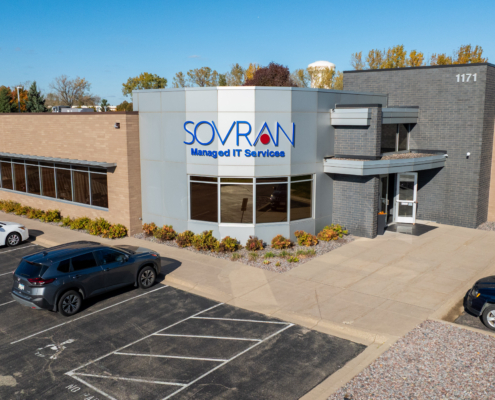 Drone picture of exterior of Sovran building front, brick and metal exterior.