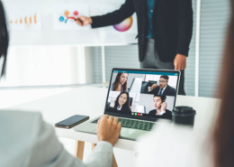 A woman using Microsoft Teams for a video call on her computer.