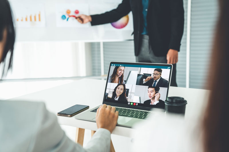 A woman using Microsoft Teams for a video call on her computer.